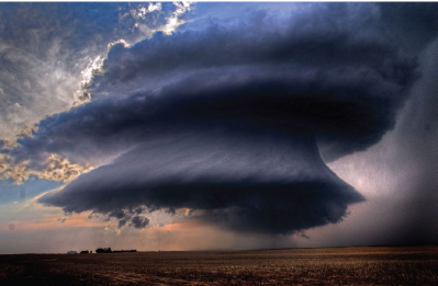 A wall cloud shows signs of rotation.